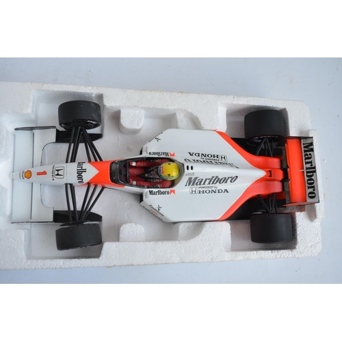 487 - Two boxed 1/18 scale diecast Formula 1 Ayrton Senna Collection car models by Minichamps (Paul's Mode... 