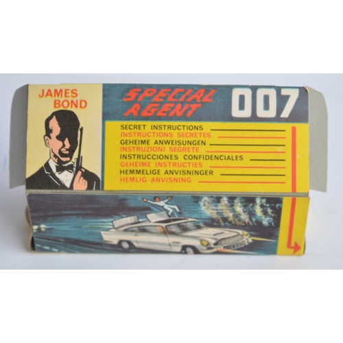 489 - Corgi James Bond gold painted Aston Martin DB5 (261) with original box, insert, spare ejecting figur... 