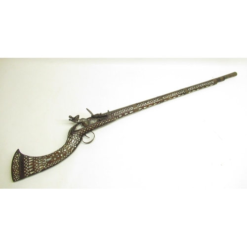 51 - Indo-Persian style flintlock musket with copper barrel rings, inlaid with mother of pearl throughout... 
