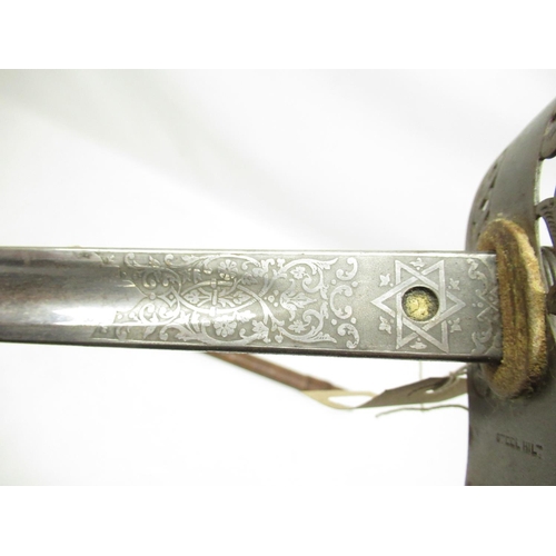 52 - 1897 patent Officers dress sword, no makers mark visible, with etched blade, leather and wire banded... 