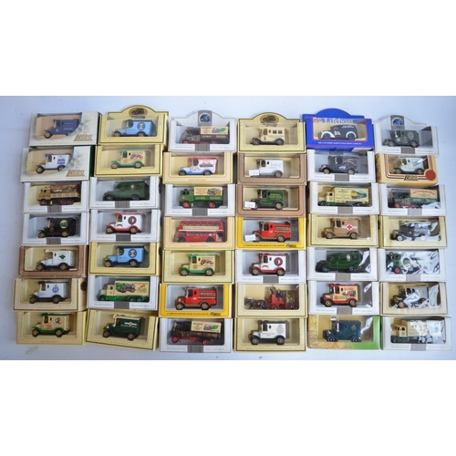 507 - Seventy boxed diecast Lledo model vehicles to include North Yorkshire Moors Railway, Red Cross, Coll... 