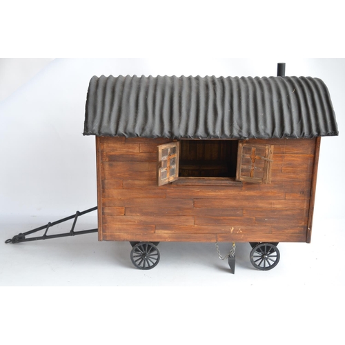 517 - Large homemade wooden shepherds hut model with removeable roof to reveal detailed interior complete ... 