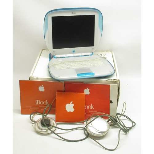 74 - Apple iBook with original box, user guides and 2 power adaptors