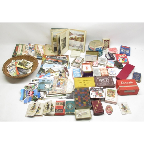 208 - Mixed collection of Postcards, Cigarette Cards and playing cards, loose, in packs and in books (2 bo... 