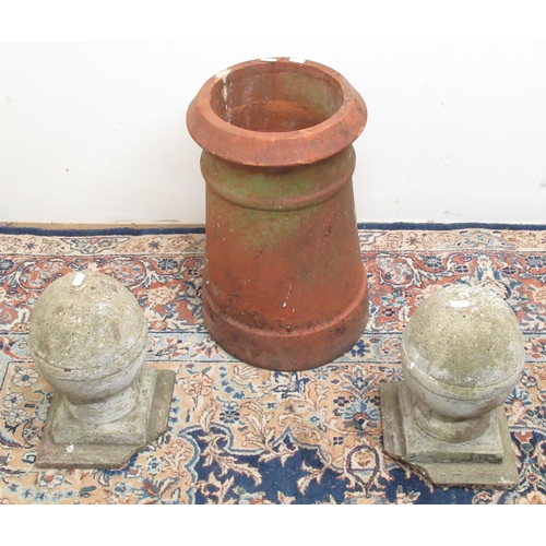 228 - C20th terracotta cannon chimney pot and 2 reconstituted stone globular finials (3)