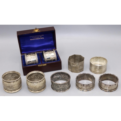 169 - Group of nine variously hallmarked C20th silver napkin rings, incl. a set of two cased napkin rings ... 