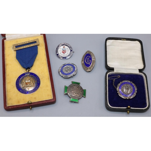 173 - Group of c1930s-1950s nursing badges and medals, incl. cased a silver and enamel Royal Manchester Ch... 