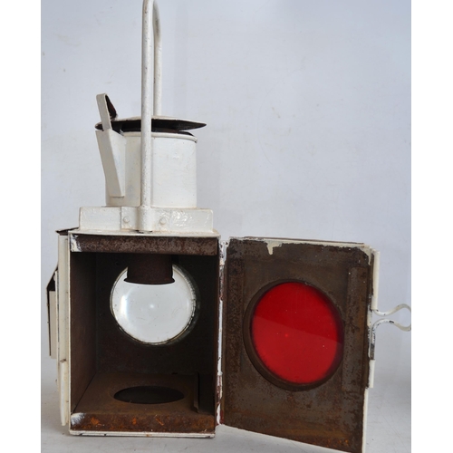 622 - Two Large white painted railway lamps (no internal burners) to include a BR(M) stamped tail lamp wit... 