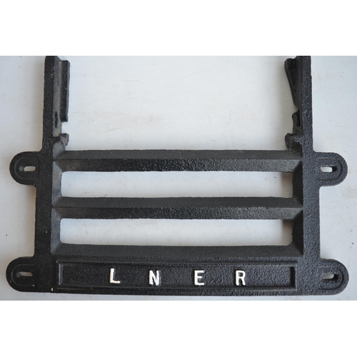 628 - Original cast iron vintage LNER station fire grate front, overall size 56.7x40.4cm