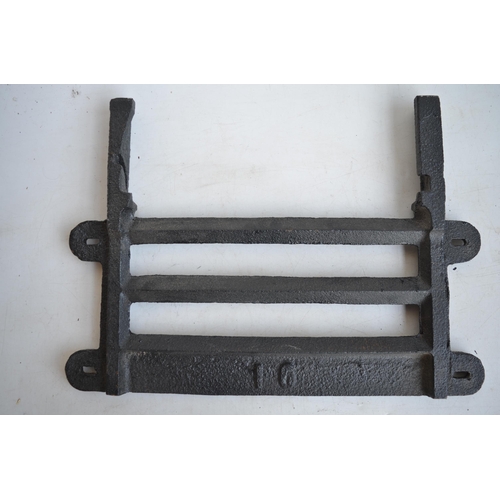 628 - Original cast iron vintage LNER station fire grate front, overall size 56.7x40.4cm