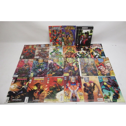 303 - Mixed collection of Judge Dredd and 2000AD books, graphic novels and comics, some by Titan Books and... 