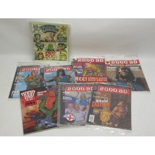 303 - Mixed collection of Judge Dredd and 2000AD books, graphic novels and comics, some by Titan Books and... 