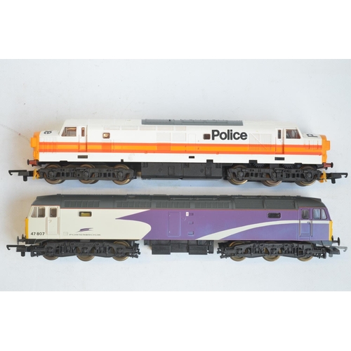 558 - Two boxed OO gauge diesel locomotives from Lima to include a Class 37 in Police livery and a Class 4... 