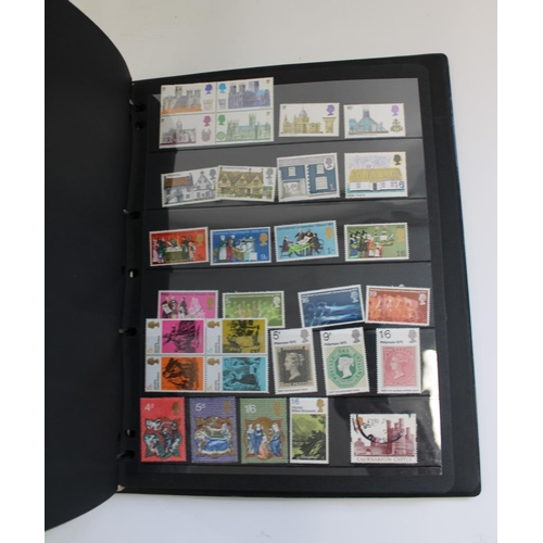 319 - Four folders of GB and world stamps, a mix of defin and commem both MNH and used