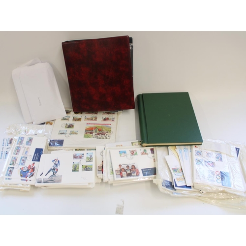 320 - Collection of Isle of Man FDCs together with an all world stamp album