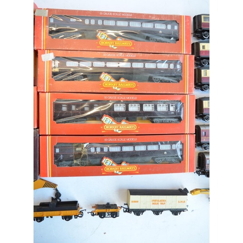 570 - Collection of OO gauge railway coaches and goods wagons to include 4x boxed Royal Train coaches. Box... 