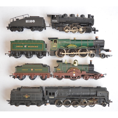 560 - Collection of previously run OO gauge electric steam train models to include Bachmann 31-952 Class A... 