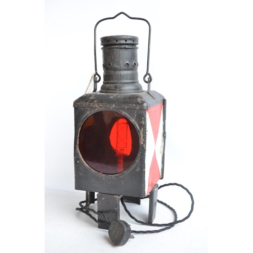 615 - An attractive vintage German Caboose lantern with fitted modern mains powered lighting. Height appro... 