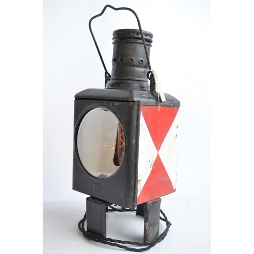 615 - An attractive vintage German Caboose lantern with fitted modern mains powered lighting. Height appro... 