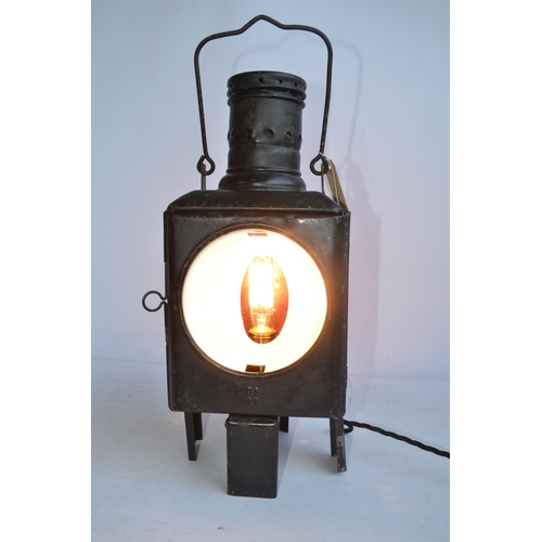 615 - An attractive vintage German Caboose lantern with fitted modern mains powered lighting. Height appro... 