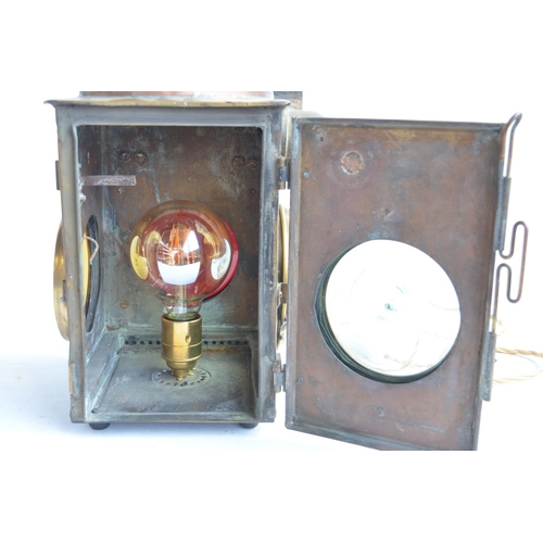 616 - An attractive vintage railway level crossing gate lamp (possibly French) in brass and copper with ad... 