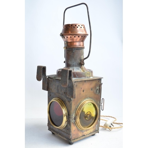 616 - An attractive vintage railway level crossing gate lamp (possibly French) in brass and copper with ad... 