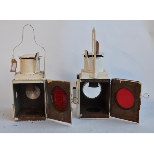 622 - Two Large white painted railway lamps (no internal burners) to include a BR(M) stamped tail lamp wit... 