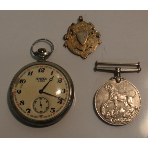 21 - War Medal 1939-45, silver watch fob, and a Sekonda pocket watch made in USSR, (3)
