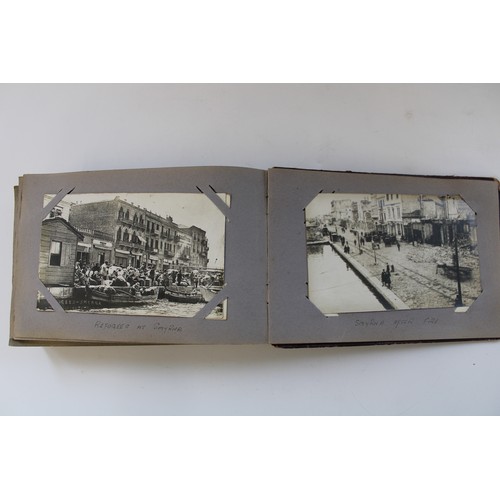 332 - c1920s postcard album showing postcards, photos and RPPCs from a Royal Navy telegraphists world tour... 