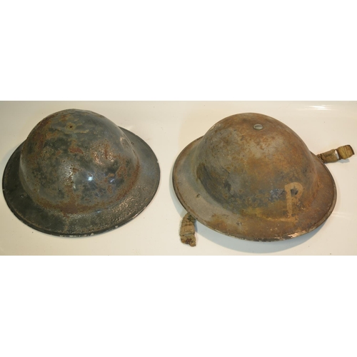 251 - Vintage British steel Brodie helmets, one marked 