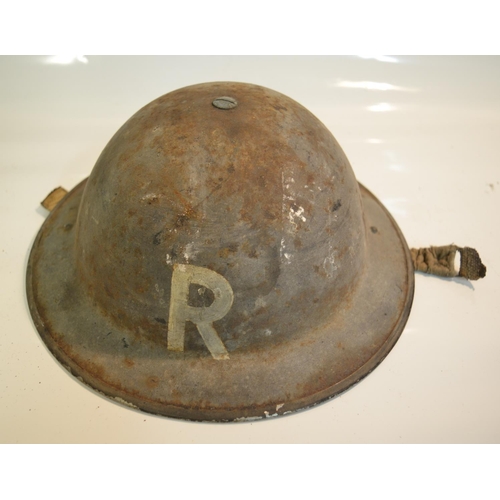 251 - Vintage British steel Brodie helmets, one marked 