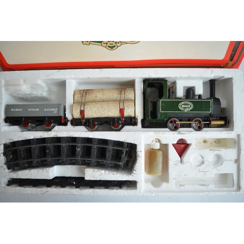 494 - Boxed Mamod RS1 steam train set, 3 wagons and a quantity of track.