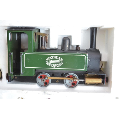 494 - Boxed Mamod RS1 steam train set, 3 wagons and a quantity of track.