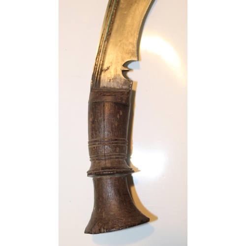 42 - C19th Nepalese Kukri fighting knife with wooden handle in original wood and leather scabbard, comple... 