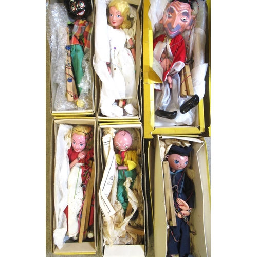 127 - Six boxed Pelham Puppets including Wizard, Grandfather, Gypsy etc.