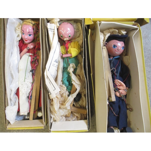 127 - Six boxed Pelham Puppets including Wizard, Grandfather, Gypsy etc.