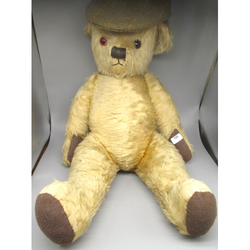 128 - Large Mid 1930's teddy bear in blonde mohair, possibly Merrythought, with repairs to pads, eyes and ... 