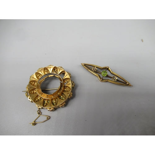 183 - 9ct yellow gold bar brooch set with green stone and seed pearls, and another 9ct yellow brooch (miss... 