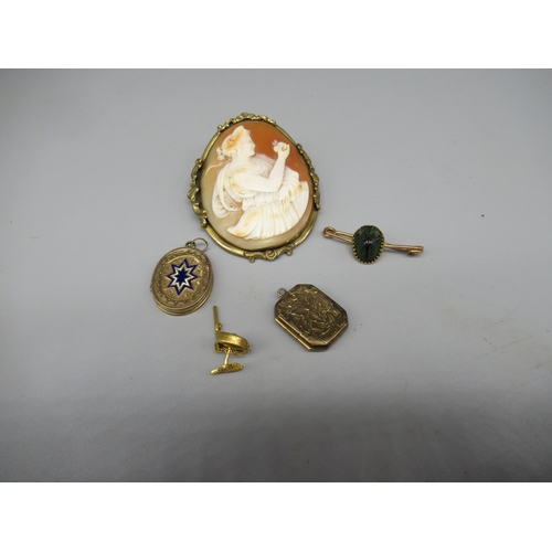 188 - Two yellow metal Edwardian locket pendants, and a yellow metal mounted cameo brooch, scarab pin and ... 