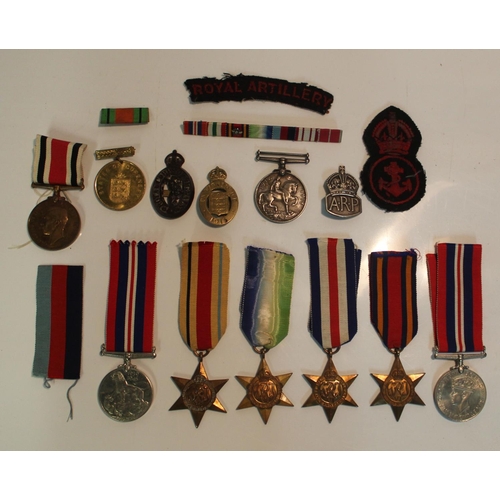 478 - Collection of Medals and badges from WWI WWII. British War Medal1914-18 awarded to John Wilson, On W... 