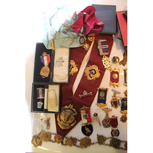 479 - Extremely large collection of Masonic items.  Jewels from various Lodges, Regalia, Sashes, Ritual bo... 