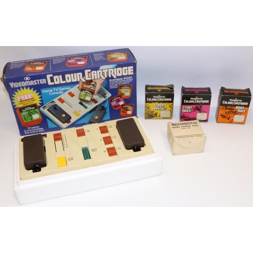 241 - Vintage Videomaster Colour Cartridge TV games console, boxed, with four games: Super Wipeout, Stunt ... 