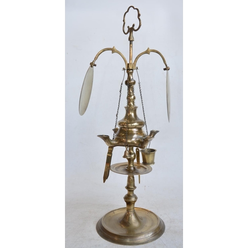 614A - Unusual antique brass students paraffin fed table lamp with carry handle and 4 lights with hanging a... 