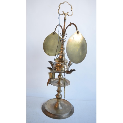 614A - Unusual antique brass students paraffin fed table lamp with carry handle and 4 lights with hanging a... 