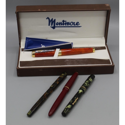 196 - Boxed Mentmore fountain pen, mottled amber coloured body, Huahong nib; Marbie, Todd & Co. Ltd. Swan ... 