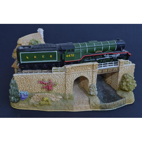 652 - Lilliput Lane Flying Scotsman model (L2661) in very good condition, 2 chips to the higher Railway Ta... 