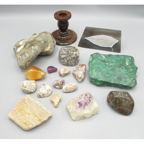 156 - Mixed collection of rocks and minerals inc. amethyst, a small red stone candlestick, etc.
