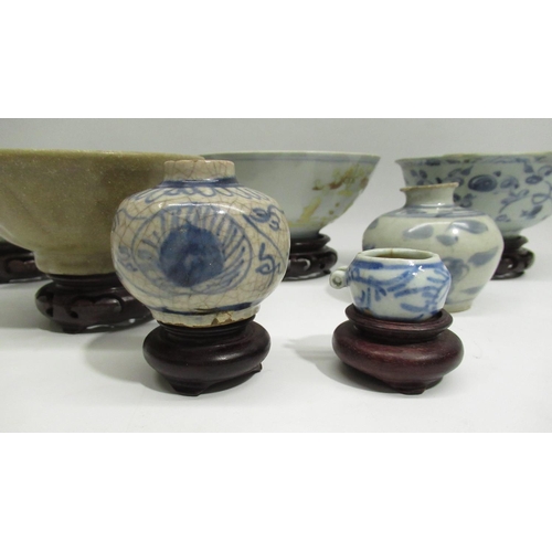 168 - Collection of Chinese pottery inc. Ming period blue and white and celadon bowl, with 6 wood stands (... 