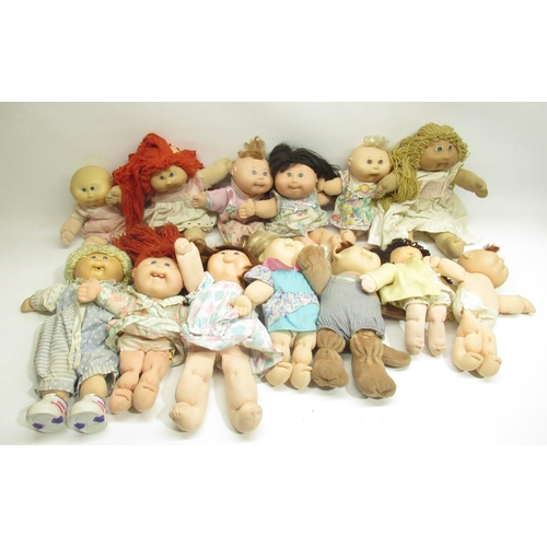 83 - Large collection of Cabbage patch dolls (49 in 3 boxes)