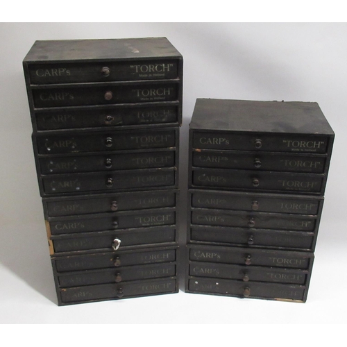 252 - Seven early C20th Carp's 'Touch'  three drawer material covered wood cotton reel chests, some retain... 